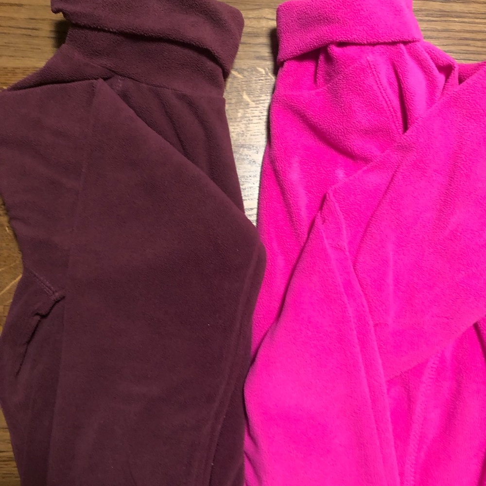2—-Women’s size Medium fleece sweatshirts.